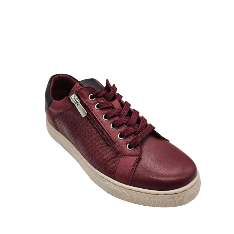 Maroon sneaker with a zipper on a white background